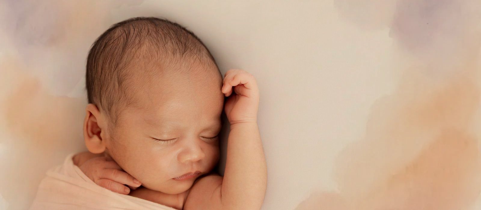 A swaddled newborn
